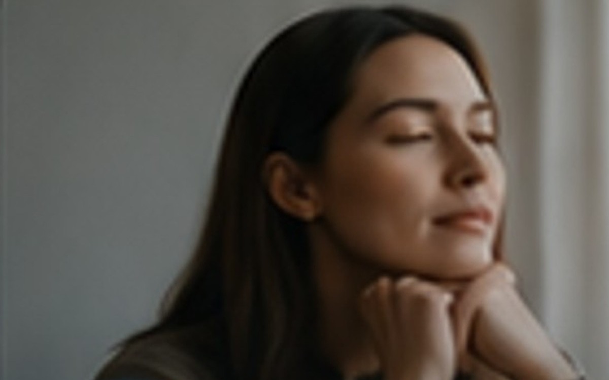 Person feeling calm in a quiet room